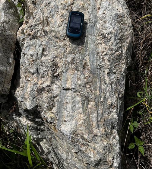 Mineral exploration rock formation with GPS device